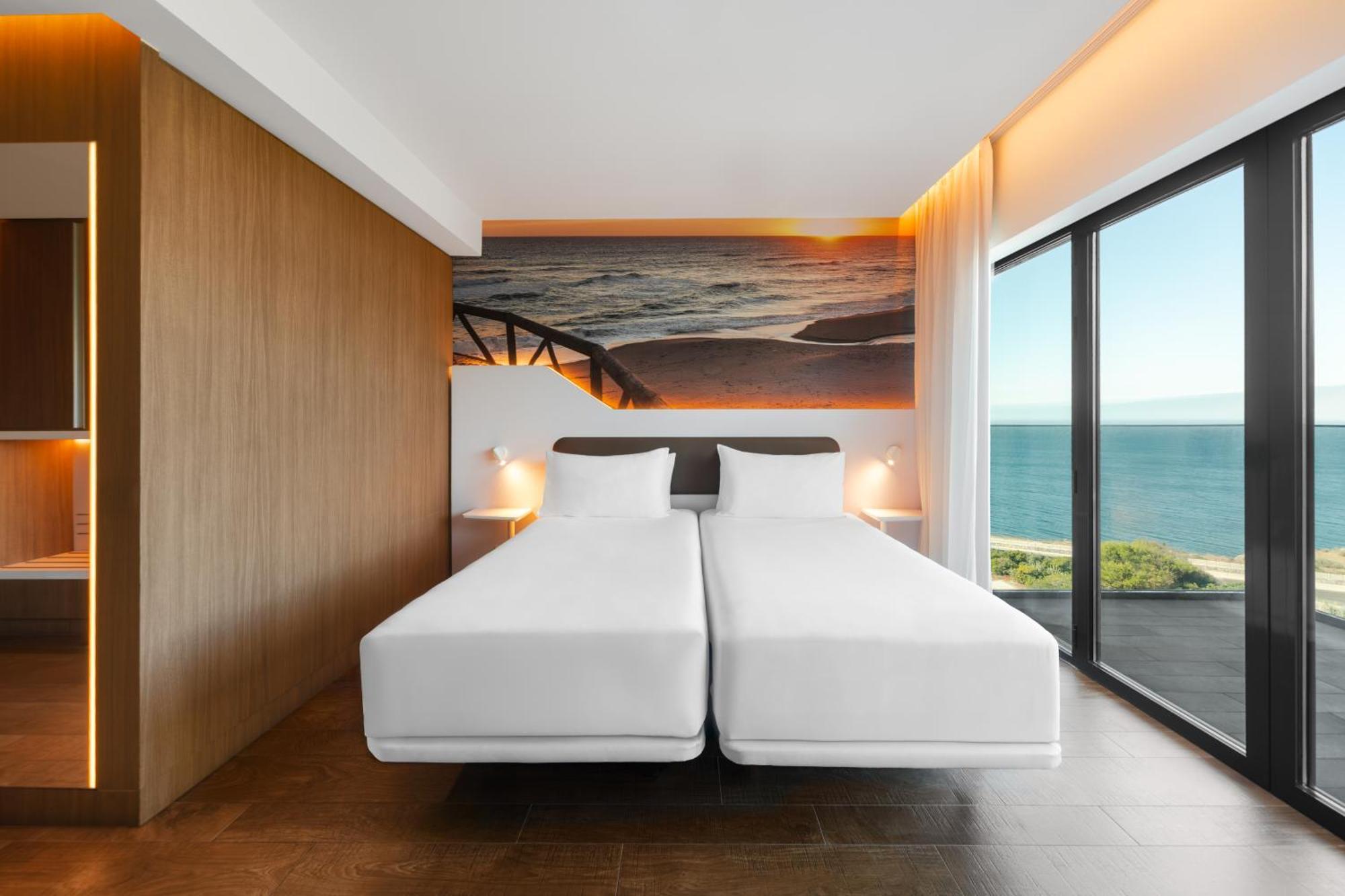 Chambre Lits Jumeaux ou Lit Queen-Size avec Balcon - Vue sur Mer